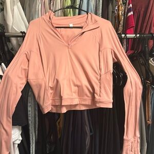Lululemon light pink/peach crop long sleeve top.